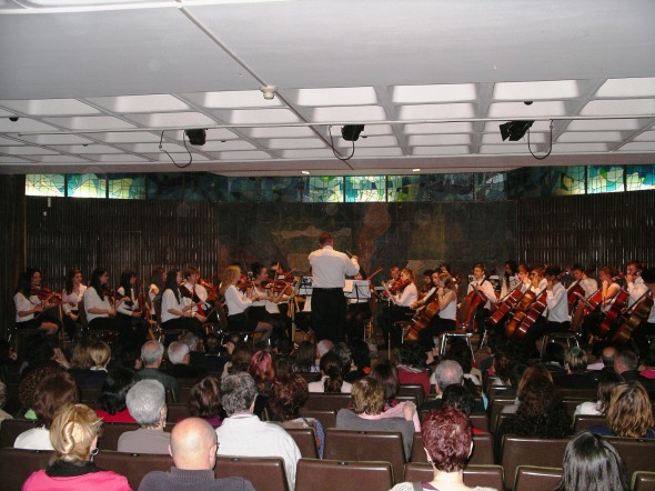 Hinsdale Central High School Orchestra performing on tour