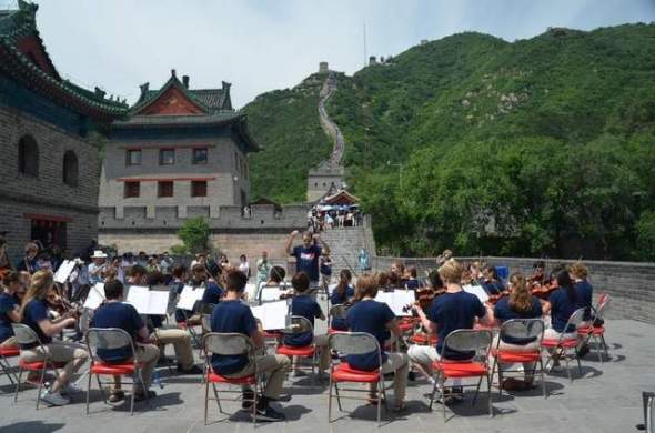 Preucil School of Music String Orchestra performing on the Great Wall
